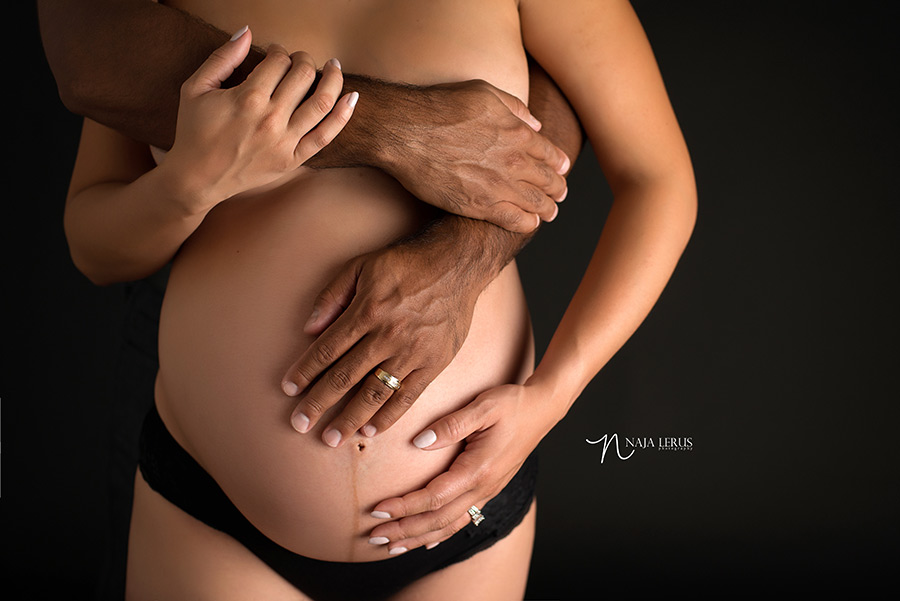 maternity pictures parents hands on belly chicago IL