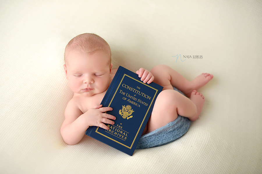 US constitution book with newborn baby chicago IL