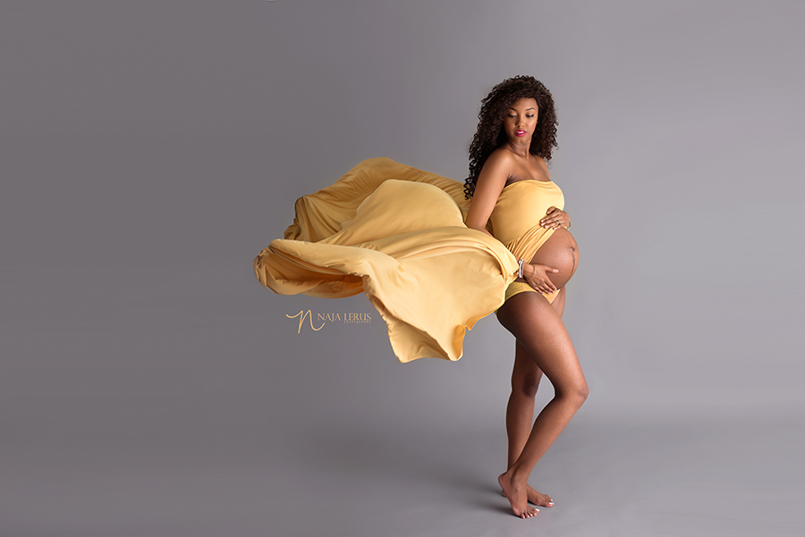 beautiful blue island IL maternity photo with flowing fabric dress