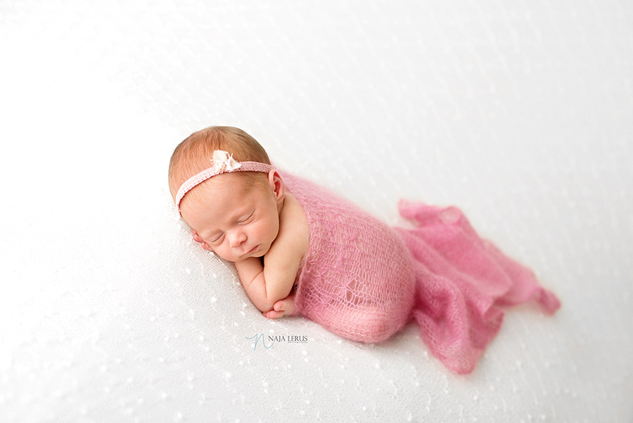 baby girl with pink wrap newborn prop chicago