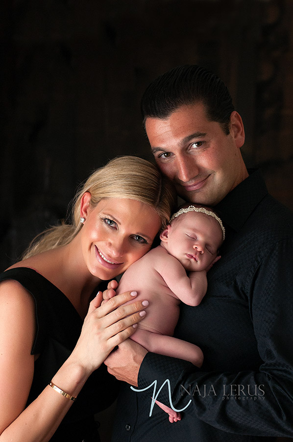 Parents shots with newborn baby in studio