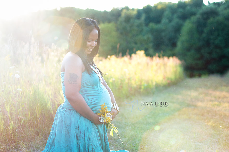 beautiful expecting mother in fields