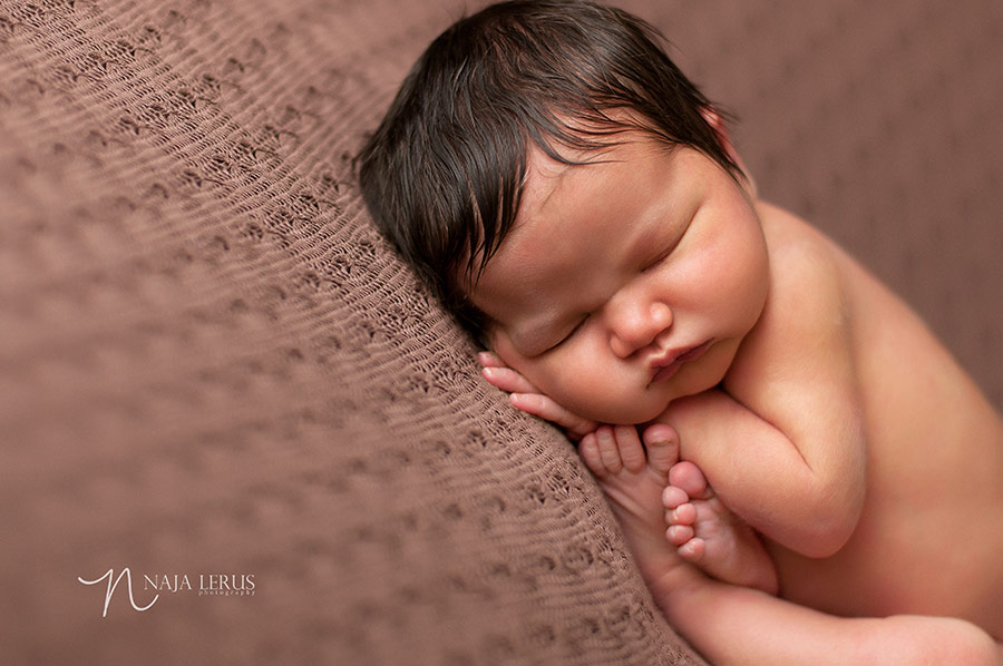 fetal position pose newborn photography 