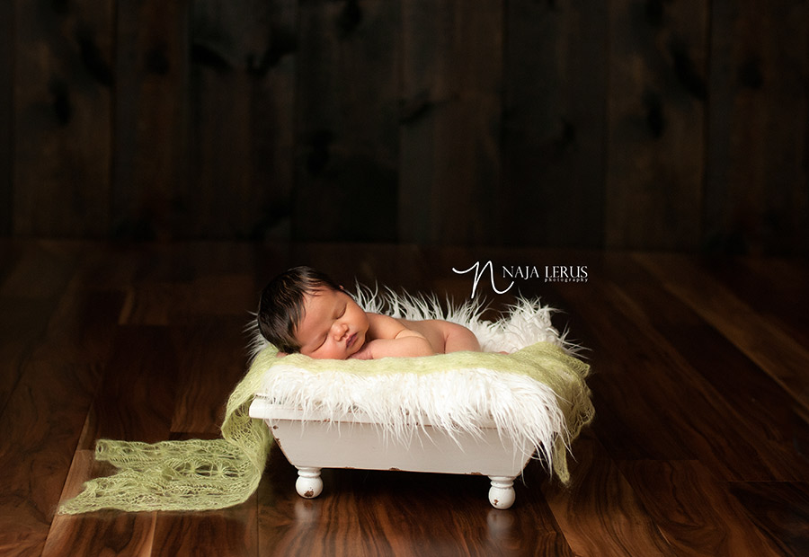 baby in prop basket newborn chicago