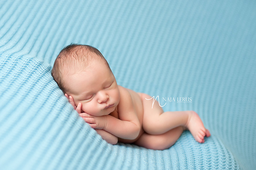 side laying posed newborn chicago