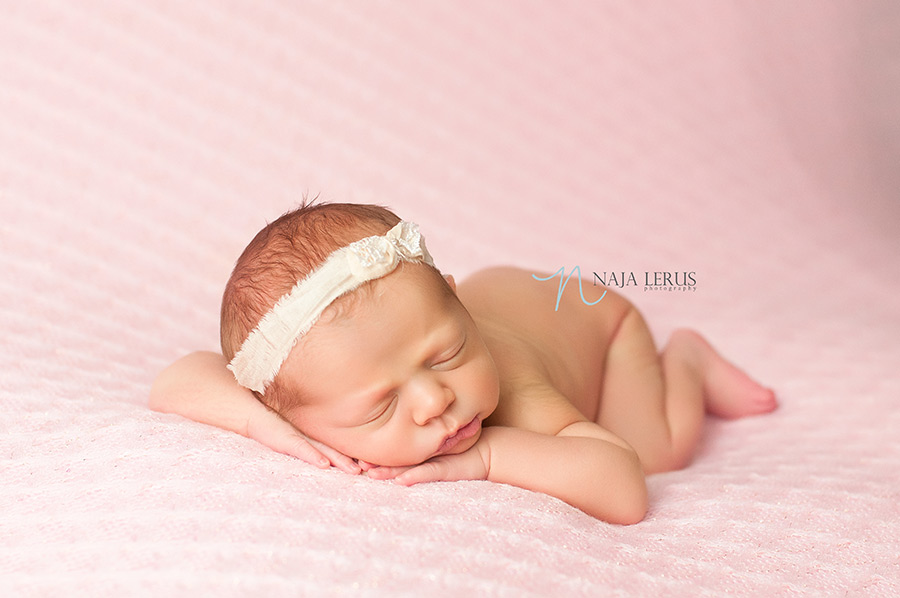 newborn baby girl on pink chicago il