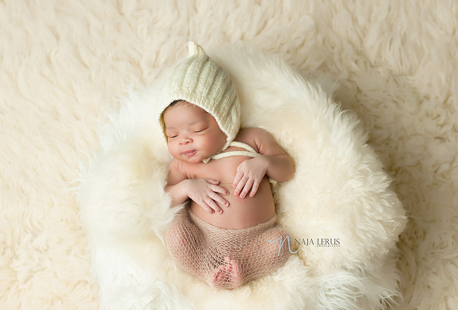 prop shots newborn photography chicago on fur