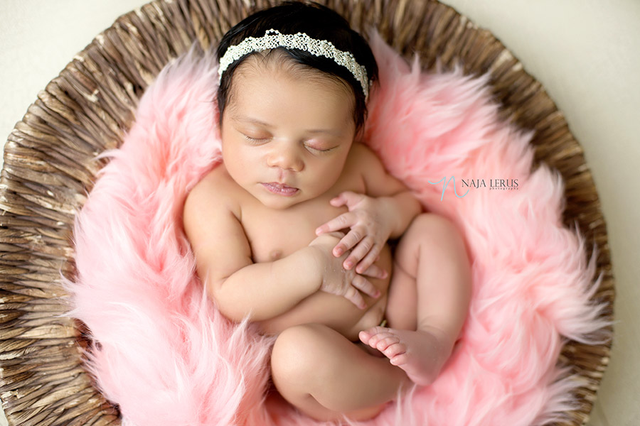 newborn in basket prop chicago il photographer newborn 