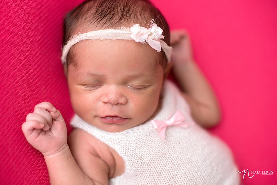 happy smiling baby posed newborn photography chicago