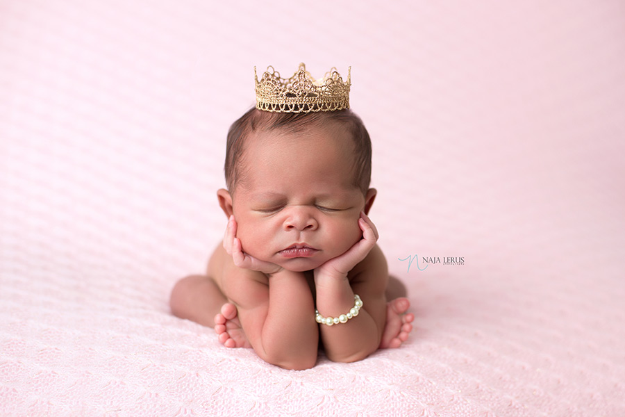 frog pose hands in cheeks chicago newborn photographer