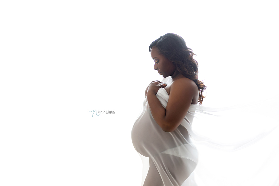 chicago maternity photographer with sheer fabric