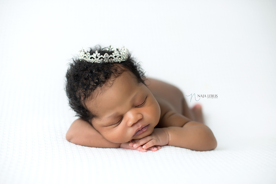 baby with crown as prop newborn photographer chicago