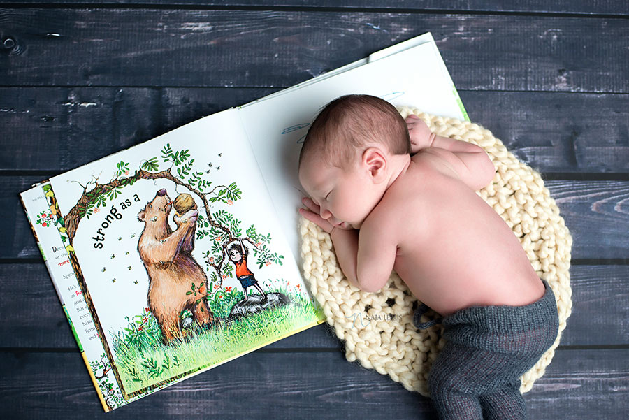 newborn baby sleep on book chicago il newborn photographer